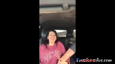 Very cute chick gets fingered to orgasm in back seat