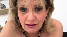 Blonde with big boobs fucked from behind before tit wanking
