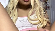 Blonde teen slut plays with a toy banana