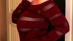 Busty babe playing with her big boobs