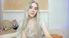 Hot Blonde Babe in Black Nylons Masturbates Solo