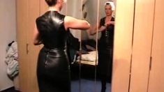 Lady putting on leather clothes