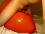 Big inflatable orange balloon humping cum